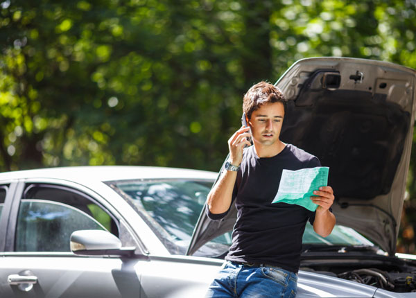 Happy family with car insurance